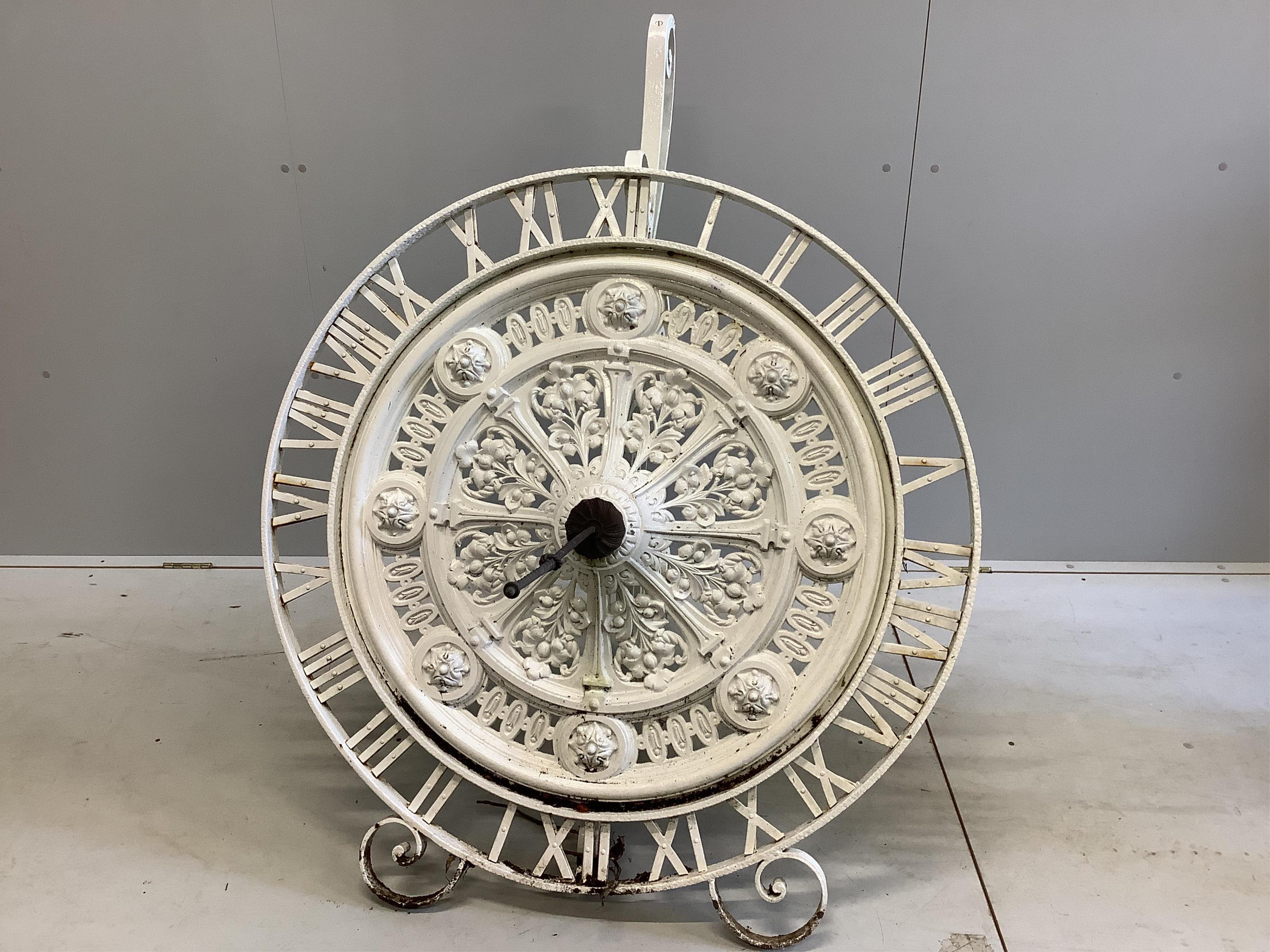 A modern white painted cast iron ‘’clock’’ sundial, height 120cm. Condition - fair